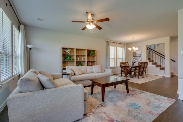 14613 Martin Creek Cv, Fort Worth, TX 76262 - living area with a chandelier, wood finished floors, stairway, and a ceiling fan