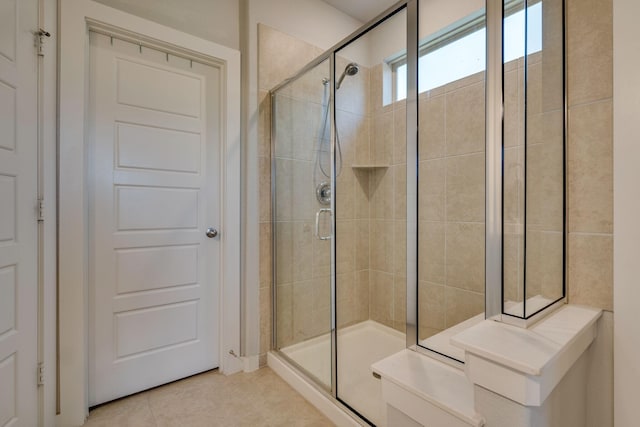 14613 Martin Creek Cv, Fort Worth, TX 76262 - bathroom with a shower stall and tile patterned flooring