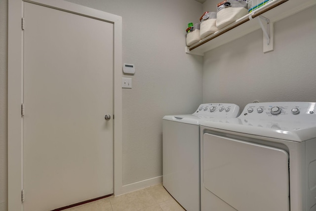 14613 Martin Creek Cv, Fort Worth, TX 76262 - laundry area featuring washing machine and clothes dryer and light tile patterned floors