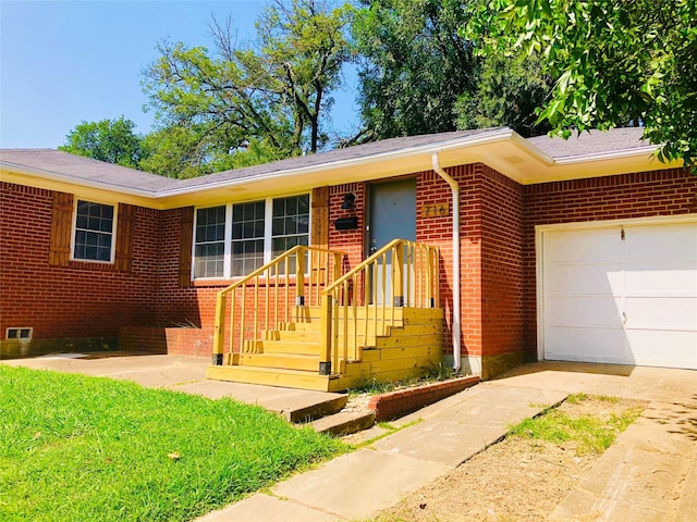 716 Kessler Blvd, Sherman, TX 75092 - ranch-style house featuring a garage, driveway, and brick siding