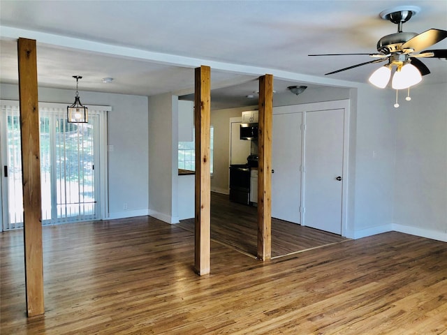 716 Kessler Blvd, Sherman, TX 75092 - unfurnished living room featuring wood finished floors and a ceiling fan