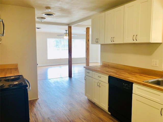 716 Kessler Blvd, Sherman, TX 75092 - kitchen with butcher block counters, black appliances, a ceiling fan, light wood-type flooring, and white cabinetry