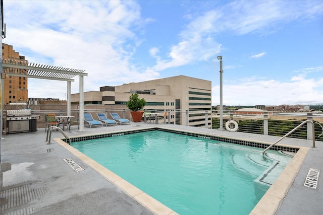 1122 Jackson St Unit 418, Dallas, TX 75202 - community pool featuring a pergola, a grill, and a patio area