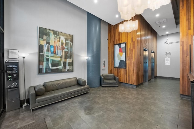 1122 Jackson St Unit 418, Dallas, TX 75202 - community lobby with wood walls, recessed lighting, and a towering ceiling