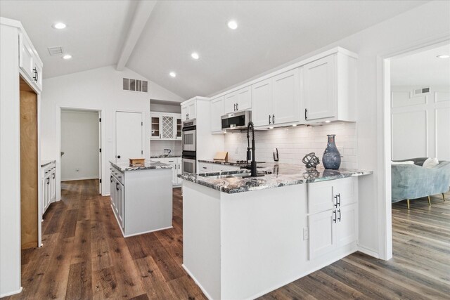 813 Lakeshore Dr, Mesquite, TX 75149 - kitchen with stone counters, decorative backsplash, stainless steel appliances, white cabinets, and open shelves