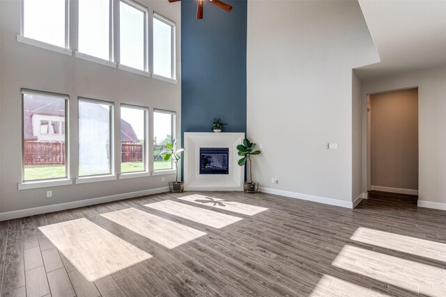 9714 Minister Ln, Frisco, TX 75035 - empty room with wood finished floors and ceiling fan