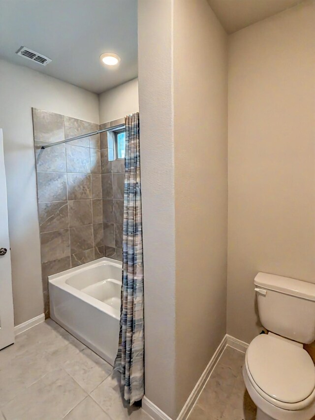 9714 Minister Ln, Frisco, TX 75035 - bathroom with shower / tub combo and tile patterned flooring