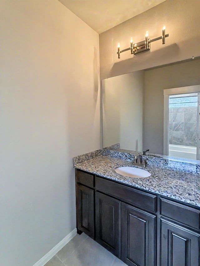 9714 Minister Ln, Frisco, TX 75035 - bathroom with vanity and tile patterned flooring
