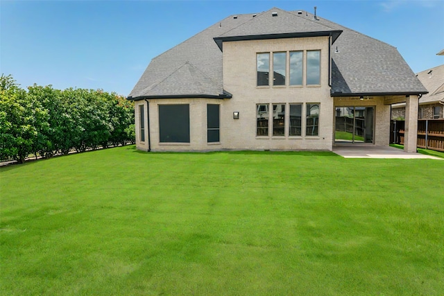 9714 Minister Ln, Frisco, TX 75035 - rear view of property with a patio area, a shingled roof, brick siding, and ceiling fan