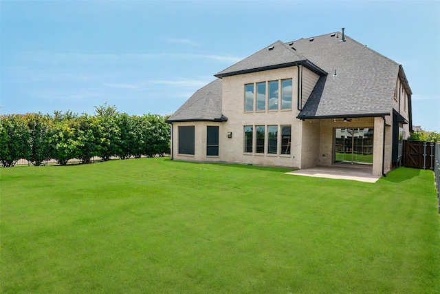 9714 Minister Ln, Frisco, TX 75035 - rear view of house with a patio, ceiling fan, and roof with shingles