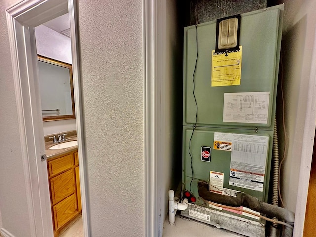 513 N Maple St, Sherman, TX 75092 - utilities with a sink and heating unit