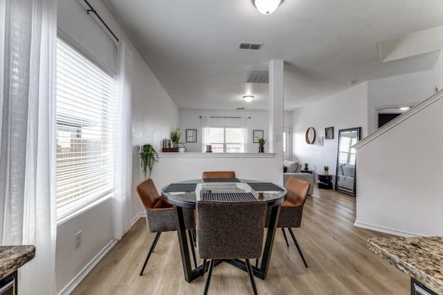 7113 Wavecrest Way, Fort Worth, TX 76179 - dining room featuring light wood-style flooring and baseboards