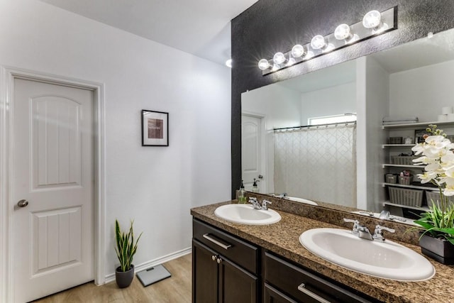7113 Wavecrest Way, Fort Worth, TX 76179 - full bathroom with double vanity, wood finished floors, and a shower with curtain