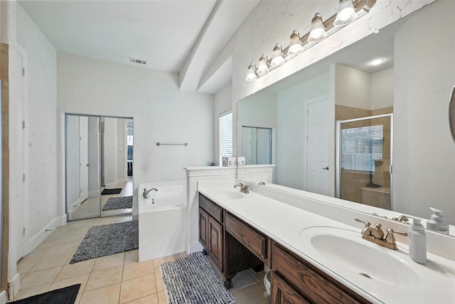 890 Wind Brook Ln, Prosper, TX 75078 - bathroom featuring a bath, a stall shower, tile patterned floors, and double vanity