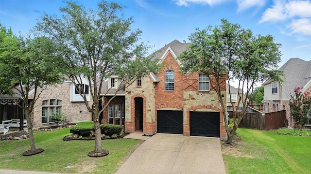890 Wind Brook Ln, Prosper, TX 75078 - view of front facade with concrete driveway, a garage, brick siding, and stone siding