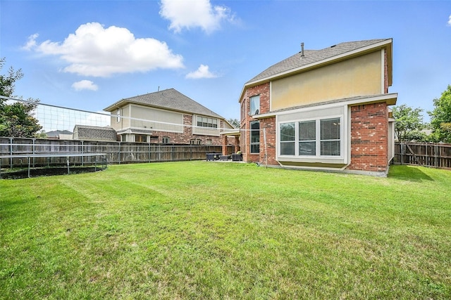 890 Wind Brook Ln, Prosper, TX 75078 - rear view of property with a fenced backyard and brick siding