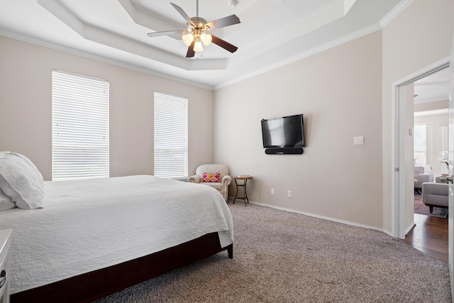 1413 Trinity Ct, Flower Mound, TX 75028 - carpeted bedroom featuring a raised ceiling, crown molding, and a ceiling fan