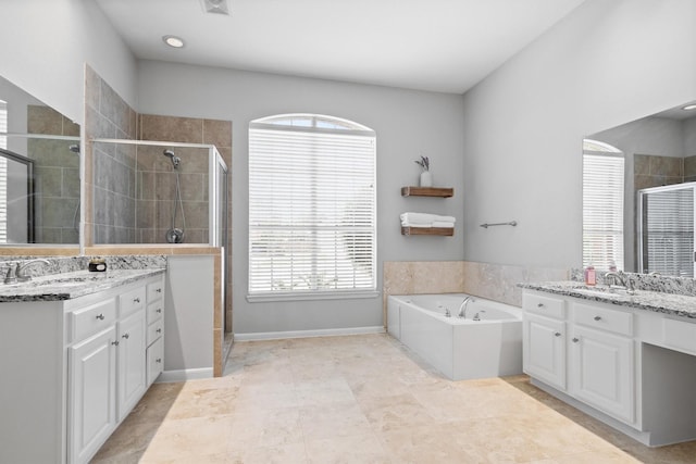 1413 Trinity Ct, Flower Mound, TX 75028 - full bath with two vanities, a shower stall, a bath, and healthy amount of natural light