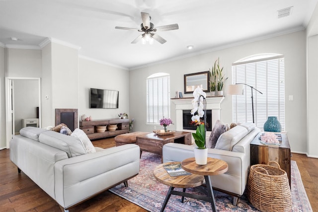 1413 Trinity Ct, Flower Mound, TX 75028 - living room featuring plenty of natural light, dark wood-style floors, ceiling fan, and ornamental molding