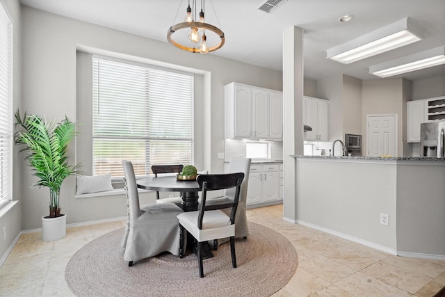 1413 Trinity Ct, Flower Mound, TX 75028 - dining space with light tile patterned flooring and recessed lighting