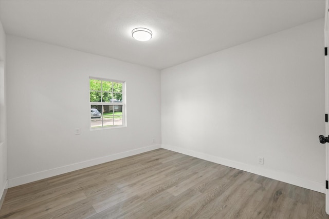 1843 Trent Dr, Arlington, TX 76010 - unfurnished room featuring light wood-style floors and baseboards