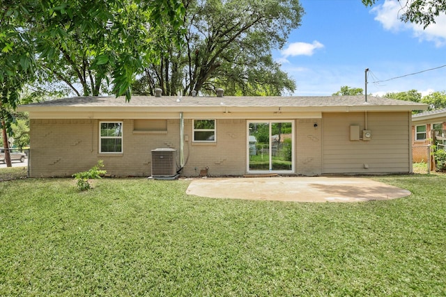 1843 Trent Dr, Arlington, TX 76010 - back of property featuring brick siding and a patio