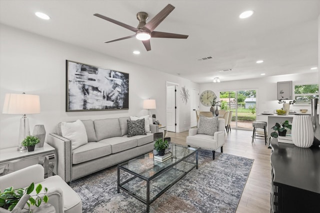 1843 Trent Dr, Arlington, TX 76010 - living room with a ceiling fan, recessed lighting, and light wood-type flooring