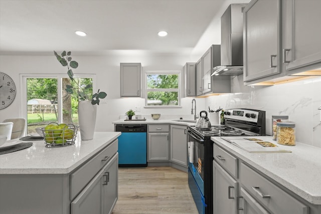 1843 Trent Dr, Arlington, TX 76010 - kitchen featuring dishwasher, range with electric stovetop, gray cabinets, wall chimney exhaust hood, and light stone counters