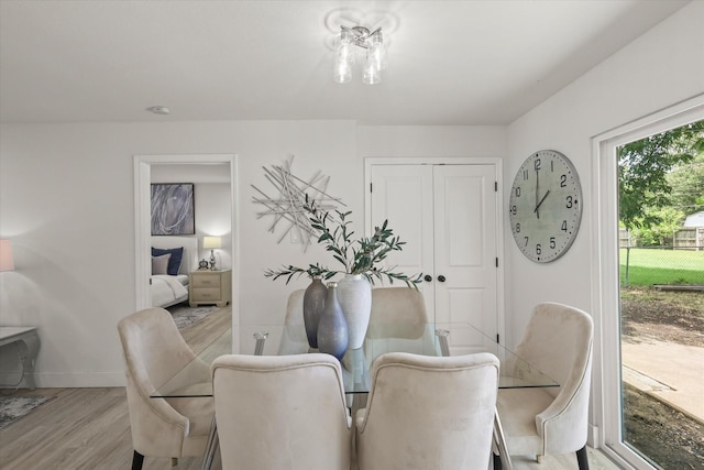 1843 Trent Dr, Arlington, TX 76010 - dining area featuring light wood finished floors and baseboards