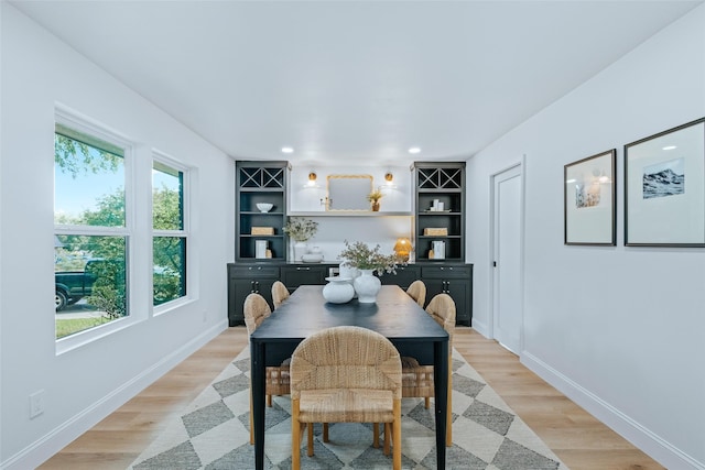 9311 Mercer Dr, Dallas, TX 75228 - dining area with recessed lighting and light wood-style flooring