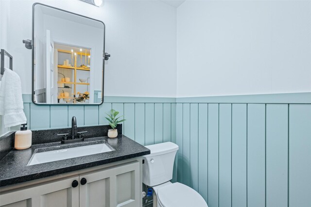 9311 Mercer Dr, Dallas, TX 75228 - bathroom featuring vanity and wainscoting