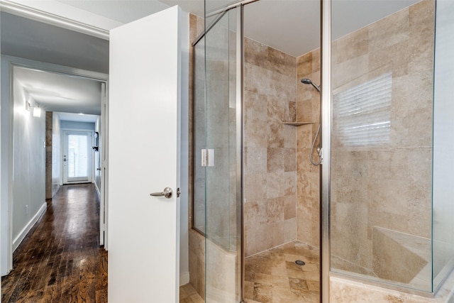 5816 Birchbrook Dr Unit 122, Dallas, TX 75206 - bathroom featuring a shower stall and wood finished floors