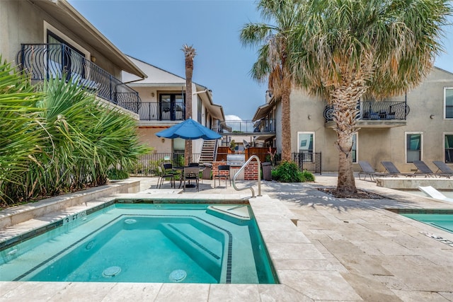 5816 Birchbrook Dr Unit 122, Dallas, TX 75206 - outdoor pool with a patio