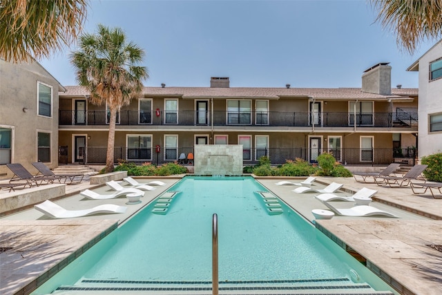 5816 Birchbrook Dr Unit 122, Dallas, TX 75206 - community pool featuring a patio