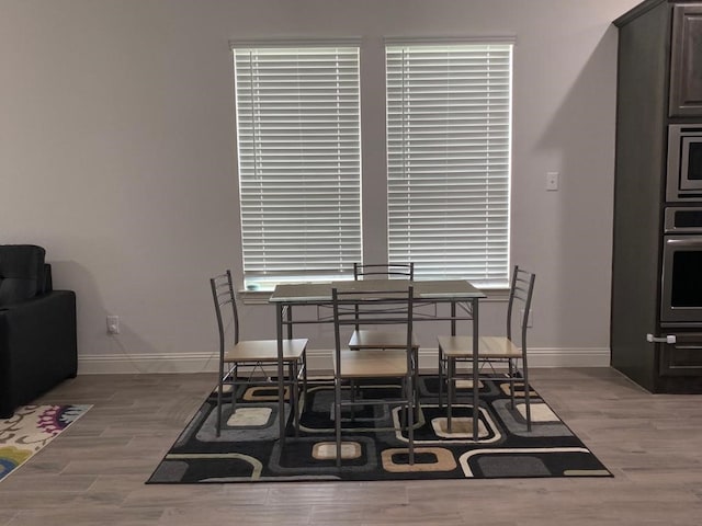 617 Saragosa Ct, Mckinney, TX 75071 - dining room with baseboards and wood finished floors