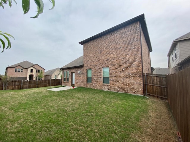 617 Saragosa Ct, Mckinney, TX 75071 - rear view of house featuring brick siding, a fenced backyard, and a patio