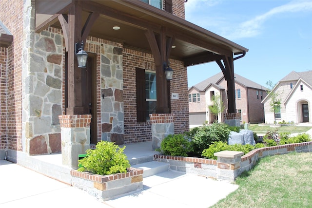617 Saragosa Ct, Mckinney, TX 75071 - entrance to property with brick siding, covered porch, and stone siding