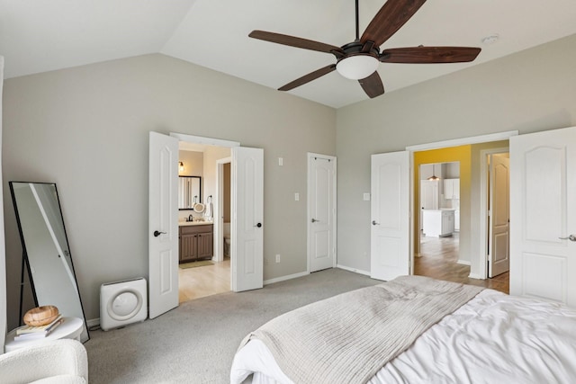 6932 Lomo Alto Dr, Fort Worth, TX 76132 - bedroom featuring vaulted ceiling, light colored carpet, connected bathroom, and a ceiling fan