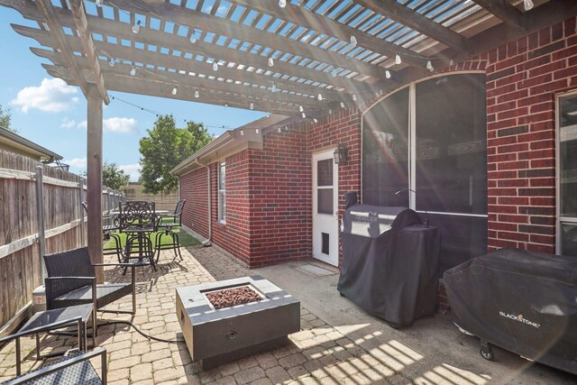 6932 Lomo Alto Dr, Fort Worth, TX 76132 - view of patio / terrace featuring an outdoor fire pit, a pergola, and outdoor dining space