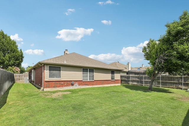 6932 Lomo Alto Dr, Fort Worth, TX 76132 - rear view of property featuring brick siding, a fenced backyard, a chimney, and roof with shingles