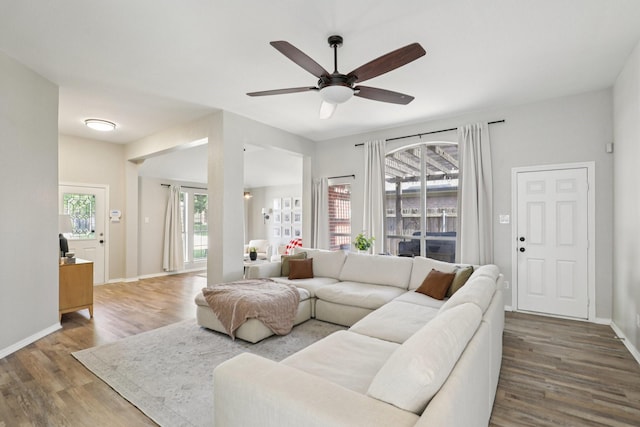 6932 Lomo Alto Dr, Fort Worth, TX 76132 - living area with wood finished floors, plenty of natural light, and ceiling fan