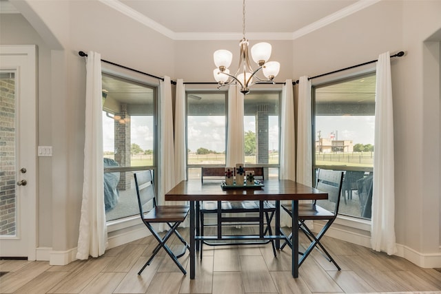 11088 Whispering Ln, Talty, TX 75126 - dining room with a chandelier, plenty of natural light, ornamental molding, and wood tiled floors