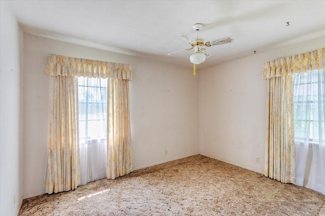 509 Lipscomb St, Bonham, TX 75418 - carpeted empty room with ceiling fan