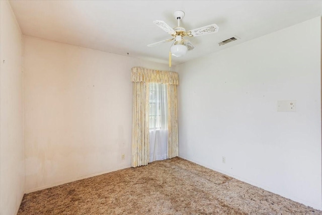 509 Lipscomb St, Bonham, TX 75418 - carpeted spare room featuring a ceiling fan and baseboards