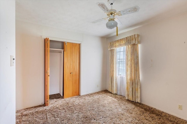 509 Lipscomb St, Bonham, TX 75418 - unfurnished bedroom with carpet floors, a closet, and ceiling fan