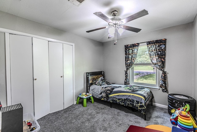 3401 Medallion Cir, Waco, TX 76706 - bedroom featuring carpet floors, a closet, and ceiling fan