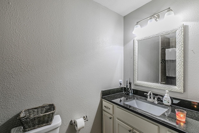 3401 Medallion Cir, Waco, TX 76706 - bathroom featuring vanity, a shower with curtain, and a textured wall