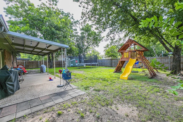 3401 Medallion Cir, Waco, TX 76706 - fenced backyard with a trampoline, a playground, a patio, and a storage unit