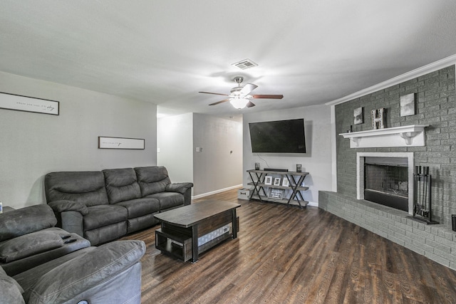 3401 Medallion Cir, Waco, TX 76706 - living room featuring a ceiling fan, wood finished floors, and a fireplace