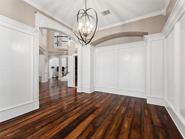 2 Pond View Ct, Mansfield, TX 76063 - unfurnished dining area with arched walkways, a chandelier, dark wood finished floors, and crown molding